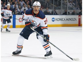 Darnell Nurse #25 of the Edmonton Oilers skates against the Toronto Maple Leafs during an NHL game at the Air Canada Centre on December 10, 2017 in Toronto.