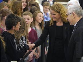 Gov. Gen. Julie Payette greets school children inside the Alberta Legislature during her first official visit to Alberta on Tuesday May 15, 2018.