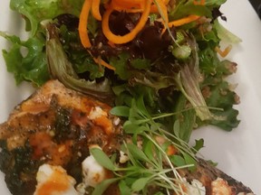 Daily specials, such as this goat-cheese crusted salmon filet, are a highlight of the Manor Bistro's offerings. GRAHAM HICKS/Postmedia