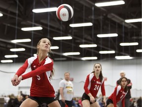 A Big Sand Force player bumps the ball during their game versus the SAS White during the 2018 Volleyball Canada Nationals at Edmonton Expo Centre in Edmonton, on Thursday, May 17, 2018.