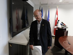 Edmonton Police Commission chairman Tim O'Brien leaves a news conference after speaking about the national search to identify outgoing police Chief Rod Knecht's replacement in Edmonton, on Friday, May 25, 2018.