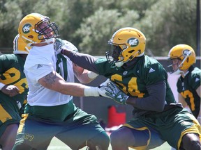 Edmonton Eskimos defensive end Alex Bazzie takes on offensive tackle Colin Kelly during mini-camp drills in Las Vegas, Nev., on Monday, April 23, 2018. Eskimos training camp begins on Saturday.