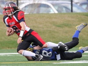 Baylie Kennedy of the Edmonton Storm makes a tackle during the 2017 Western Women's Canadian Football League season.