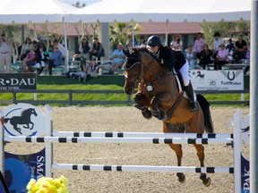Edmonton-based show jumper Jaclyn Duff and horse EH All or None clearing a hurdle in 2016.