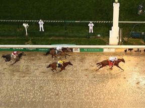 ustify #7, ridden by jockey Mike Smith crosses the finish line to win the 144th running of the Kentucky Derby at Churchill Downs on May 5, 2018 in Louisville, Ky. (Jamie Squire/Getty Images)