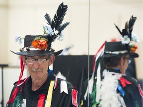 John Archer of the Edmonton Magpie Dancers stands in front of a mirror at King Edward Hall as part of the Medieval Hall on 20, 2018 in Edmonton. Photo by Shaughn Butts / Postmedia