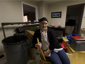 Lisa Nichols, pictured in her Fort McMurray home in April 2017, feels let down by her insurance company. She was diagnosed with cancer not long before the fire and is still living in a basement apartment.