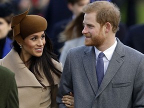 FILE - In this Monday, Dec. 25, 2017 file photo, Britain's Prince Harry and his fiancee Meghan Markle arrive to attend the traditional Christmas Day service, at St. Mary Magdalene Church in Sandringham, England. Royal wedding organizers on Thursday May 17, 2018, are preparing for a rehearsal of the proceedings to take place in Windsor -- but without the bridge and groom.