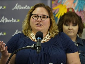 Alberta Health Minister Sarah Hoffman announces the expansion of mental health supports to youth in schools across Alberta on Monday May 7, 2018 at Jasper Place School in Edmonton. Jasper Place graduate Claire Allen listens in the background.