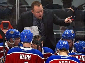 Edmonton Oil Kings head coach Steve Hamilton talks to his players as they palyed the Brandon Wheat Kings during WHL action at Rogers Place in Edmonton, October 6, 2017.