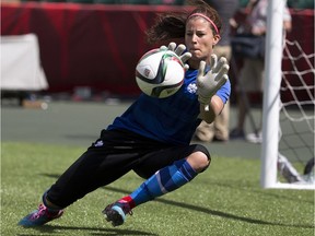 Stephanie Labbe blocks a shot during a Team Canada practice on June 5, 2015, in Edmonton. Greg Southam / Postmedia