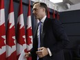 Finance Minister Bill Morneau leaves a press conference after speaking about the Trans Mountain Expansion project in Ottawa on Wednesday, May 16, 2018. THE CANADIAN PRESS/ Patrick Doyle ORG XMIT: PD109