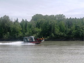 Edmonton Fire Rescue Service's rescue boat on the North Saskatchewan. Neil Waugh/Postmedia