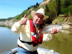 Neil with his 24-carat North Saskatchewan River goldeye. For Neil Waugh Outdoors column in May 19, 2018 Edmonton Sun. Neil Waugh/Postmedia