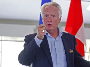 Senator Doug Black, shown here speaking to the Grande Prairie Rotary Club in 2014, introduced a bill in February clarifying federal jursdiction over Trans Mountain.