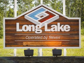 A sign at Nexen Energy's Long Lake facility near Fort McMurray, Alta., Wednesday, July 22, 2015. Nexen Energy has pleaded not guilty to all eight charges in relation to an explosion on their site that killed two workers.