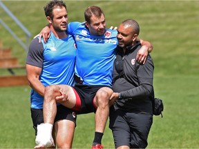 Canada's Gordon McRorie being carried off the field after injuring himself during practice ahead of hosting Scotland in an international rugby match on Saturday in Edmonton June 4, 2018. Ed Kaiser / Postmedia