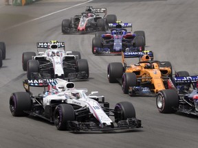 Williams driver Lance Stroll (18) of Canada makes his way in to the first turn at the Canadian Grand Prix in Montreal on Sunday, June 10, 2018. Stroll crashed on the first lap of the race.