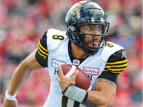 Jeremiah Masoli #8 of the Hamilton Tiger-Cats makes a pass against the Calgary Stampeders during a CFL game at McMahon Stadium on June 16, 2018 in Calgary.