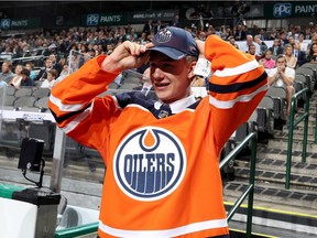 Ryan McLeod reacts after being selected 40th overall by the Edmonton Oilers during the 2018 NHL Draft at American Airlines Center on June 23, 2018 in Dallas, Texas.