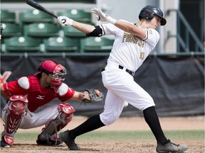 Edmonton Prospects Matt Coutney swings at the ball against the Okotoks Dawgs on Sunday, June 3, 2018 in Edmonton.