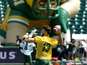 Edmonton Eskimos quarterback Mike Reilly throws the ball during team practice at the Edmonton Eskimos Fan Day held at Commonwealth Stadium in Edmonton on Sunday June 3, 2018.