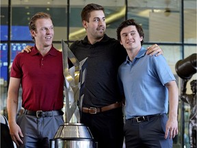 Tyler Benson (left), Kailer Yamamoto (middle) and Evan Bouchard (right) with the Hlinka Gretzky Cup outside Rogers Place in Edmonton on June 26, 2018.