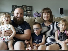 (Left to right) Rose Fry, Adam Fry, William Fry, Shannon Epler and Mackenzie Fry pose for a photo at home in Edmonton, on Friday, June 8, 2018. William, 5, is in a kindergarten class at Tipaskan School with 33 children.