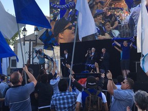 UPLOADED BY: Derek  Van Diest  ::: EMAIL: dvandiest@postmedia.com ::: PHONE: 780-868-6838  ::: CREDIT: Derek Van Diest  ::: CAPTION: FC Edmonton fans cheer as the club announces it is joining the Canadian Premier League at a launch party in Old Strathcona on Friday, June 8, 2018.