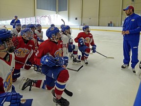 Coach Fernando Pisani talks to players at Edmonton Oil Kings development camp at the Downtown Community Arena in Edmonton on June 2, 2018.