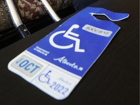 The city apologized Tuesday for planning to cancel a longstanding program that gave people with accessibility placards free on-street parking.