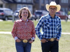 Premier Rachel Notley, and Minister of Finance Joe Ceci, arrive at Scotsman's Hill in Calgary on Wednesday July 4, 2018. Leah Hennel/Postmedia