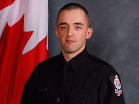 An investigative agency has found no fault with Edmonton police during an attempted arrest that led to the death of Const. Daniel Woodall and a suspect accused of criminal harrassment. Const. Woodall, of the EPS Hate Crimes Unit, poses in this undated handout photo.
