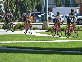 A group of University of Texas students cycling from Austin, Texas to Anchorage, Alaska, called the Texas 4000, arrived at MacEwan University Wednesday during their 4,000-mile charity ride for cancer, in Edmonton, July 18, 2018.