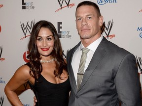 WWE Diva Nikki Bella (L) and John Cena attend WWE & E! Entertainment's "SuperStars For Hope" at the Beverly Hills Hotel on August 15, 2013 in Beverly Hills, Calif.