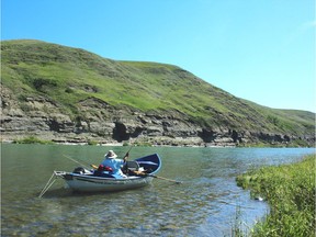 Bow River Guide Barry White casts a line on the beautiful, sparkling Bow. Neil Waugh/Edmonton Sun