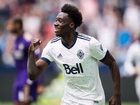 Vancouver Whitecaps forward Alphonso Davies celebrates his goal against Orlando City during the second half of an MLS soccer game in Vancouver, on Saturday June 9, 2018.