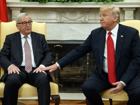 President Donald Trump meets with European Commission president Jean-Claude Juncker in the Oval Office of the White House, Wednesday, July 25, 2018, in Washington. (AP Photo/Evan Vucci)