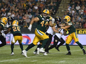 Eskimos fullback Alex Dupuis at work against the Hamilton Tiger-Cats.