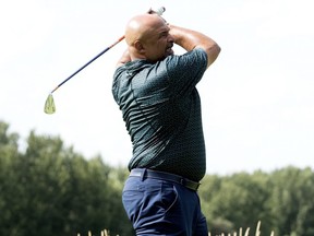 Grant Fuhr tees off on the 15th hole during the 2018 Syncrude Oil Country Championship Celebrity Pro-Am at the Petroleum Golf and Country Club, Tuesday July 31, 2018.