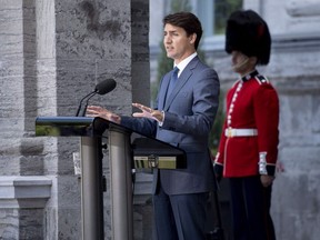 Prime Minister Justin Trudeau speaks during a press conference following a swearing in ceremony at Rideau Hall in Ottawa on Wednesday, July 18, 2018. THE CANADIAN PRESS/Justin Tang ORG XMIT: JDT114