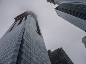 The JW Marriott hotel in the Edmonton Ice District reaches into the clouds on March 19, 2018.