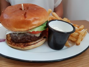 A singularly delicious 9 oz. beef patty was within Wilfred's burger.