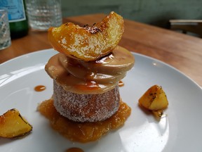 Heaven on Earth: Cafe Linnea's buttery fois gras on a doughnut, topped with peach. PHOTOS BY GRAHAM HICKS/EDMONTON SUN