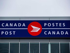 The Canada Post logo is seen on the outside the company's Pacific Processing Centre, in Richmond, B.C., on June 1, 2017.