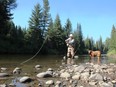 Neil and Penny on the Embarras River southwest of Edson. Neil Waugh/Edmonton Sun