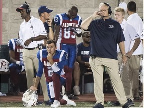 Montreal Alouettes quarterback Johnny Manziel and head coach Mike Sherman look on from the sideline during second half CFL football game against the Edmonton Eskimos in Montreal, Thursday, July 26, 2018.