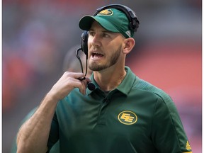 Edmonton Eskimos head coach Jason Maas stands on the sideline during first half CFL football action against the B.C. Lions, in Vancouver on Aug. 9, 2018.