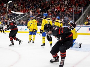 Canada's Sasha Mutala (14) celebrates his goal against Sweden's goaltender Hugo Alnefelt (1) during first period Hlinka Gretzky Cup gold medal game action in Edmonton on Saturday, August 11, 2018.