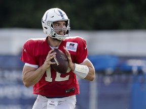 Indianapolis Colts quarterback Andrew Luck throws during practice. Luck will see his first action since the final game of the 2016 season when he starts this week against Seattle. (Michael Conroy/The Associated Press)